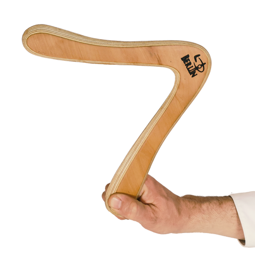 Image of Berliner Size Comparison, Hand gripping wooden returning boomerang with "Berlin" brand marking on maple plywood