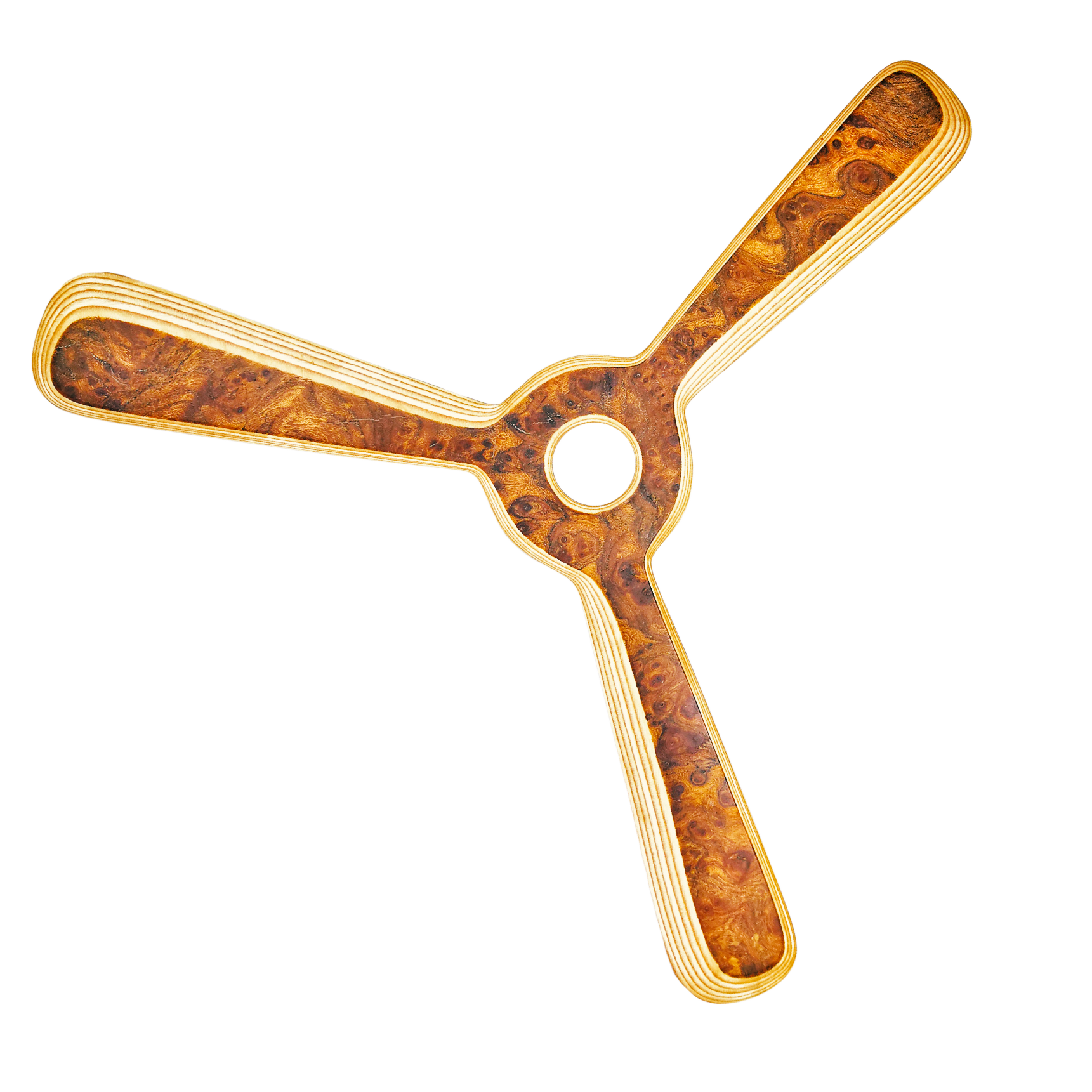 Image of Navigator Boomerang dynamic shot with center hole and golden swirl patterns on laminated edges