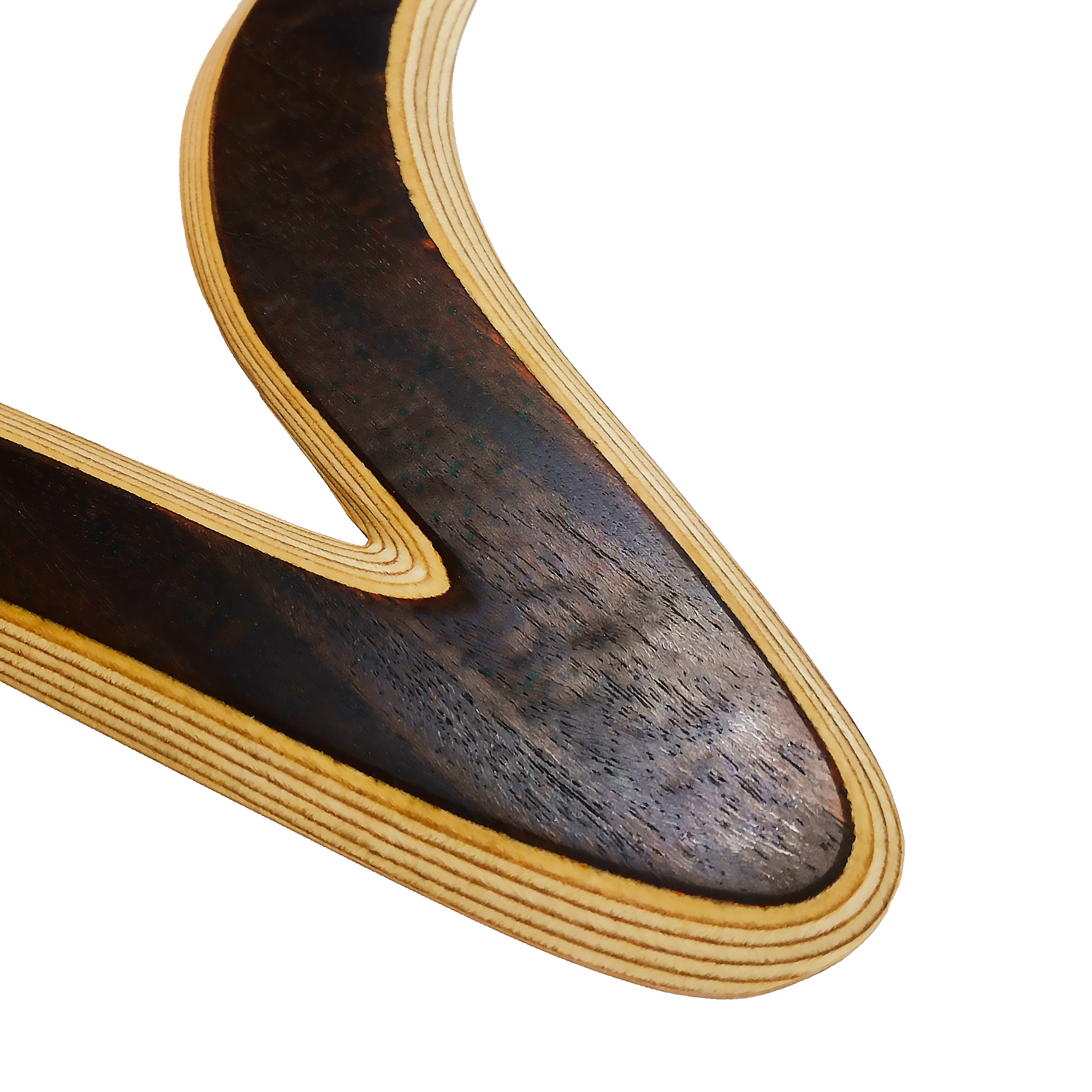 Image of Venezia Boomerang  close-up shot  showing Detailed view of ebony boomerang curve with fine black wood texture