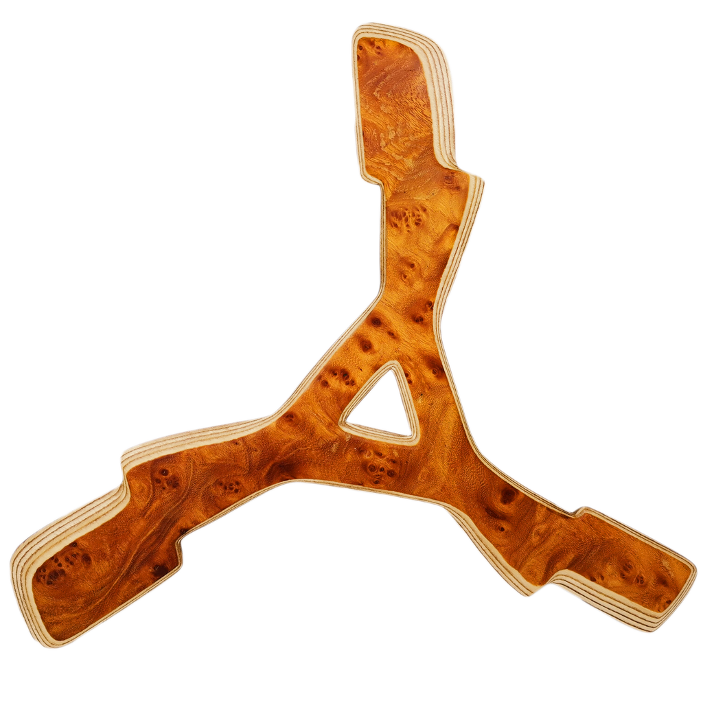 Image of Zeus straight-on shot with  three-arm Karelian birch burl, triangular center cutout and golden eye patterns